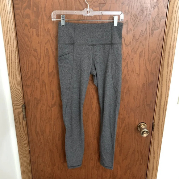 Athleta Stash Pocket Salutation Tight Leggings - Picture 1 of 6